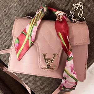Chic Pink Sling Bag with Floral Scarf