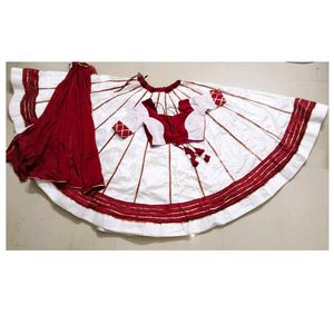 Maroon & white lehenga choli.