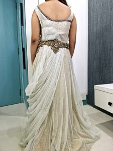 Silver Heavy Work Long Full Flair Gown For Women.