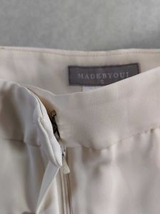 Light beige trousers