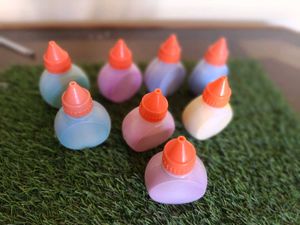 Colour Rangoli With Cute Bottles