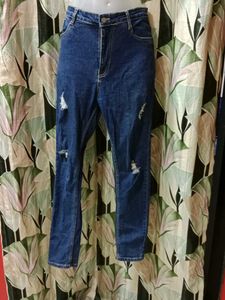 Ripped Dark Blue Jeans