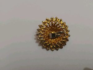 Gold tone floral adjustable ring