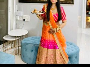Elegant Silk Orange And Pink Lehanga