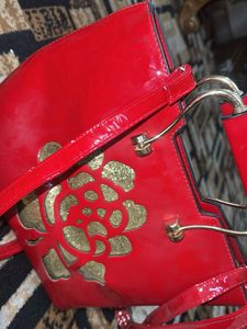 Red Handbag with Floral Detail