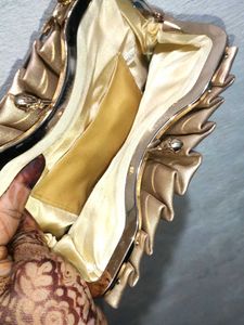 Elegant Gold Embellished Clutch