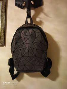 geometrical holographic luminous backpack
