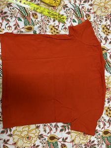 Basic Orange Top  With A Little Print In Center
