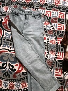 Ripped Knee Denim Jeans