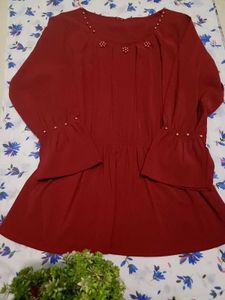 Burgundy blouse with pearl detail