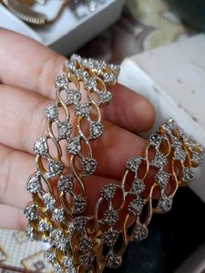 Bangles With Silvery And Golden Touch