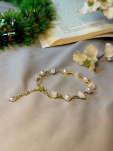 wire wrapped rose quartz and pearl bracelet