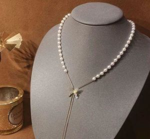 Pearl Necklace with Butterfly Pendant