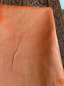 Vacating ‘Orange Crepe Saree : No Blouse