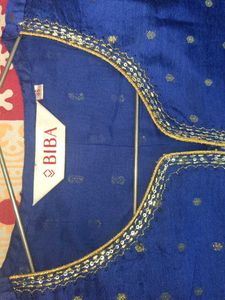Blue kurti with gold polka dots