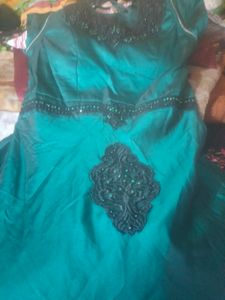 Party Wear Good Looking Gown In Rama Green Colour