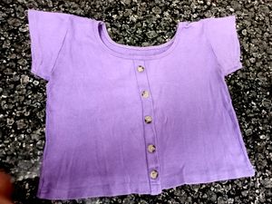 size- XS/S. A beautiful lilac crop top with button detailing.wollen like thick material