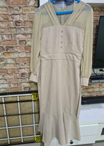 Elegant Beige Midi Dress with Ruffle Hem