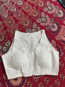 White Sleeveless Blouse