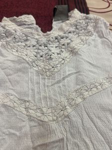 White Sleeveless Top