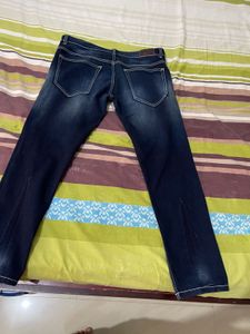 Distressed Denim Jeans