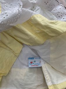Cute White-yellow Frock With Pace Detailing