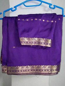 Elegant Purple Saree With Stiched Blouse .