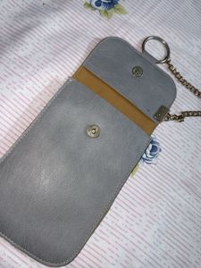 Cute phone and accesory sling bag