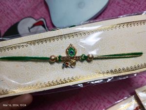 New Green Om &amp; Peacock Feather Religious Rakhi
