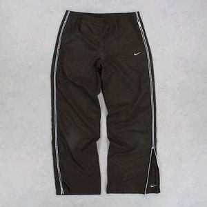 NIKE PARACHUTE BAGGY TRACKS.
