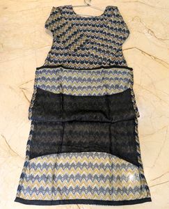 Elegant Kurta with Dupatta in shades of Green.