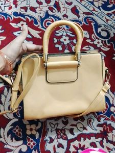 Elegant Handbag with Floral Detail