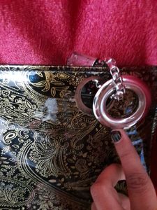 Black Handbag With Gold Detailing