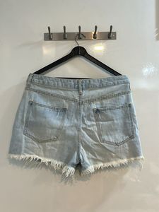Forever 21 Light Wash Denim Ripped Shorts
