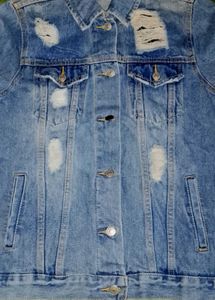 Distressed Denim Jacket Size M. both girls and boy