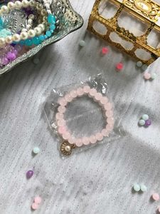 Pink Beaded Bracelet with Shell Charm