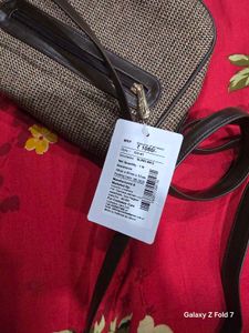 brand new knitted style sling never used with tag