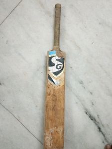 REAL WOODEN SG BAT IN OK CONDITION WITH 2 TENNIS BALL FREE READ DESCRIPTION FOR MORE INFORMATION