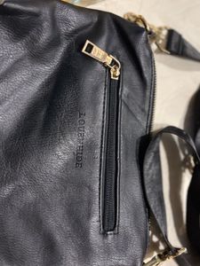 louenhide authentic sling bag