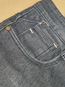 Distressed Blue Denim Jeans
