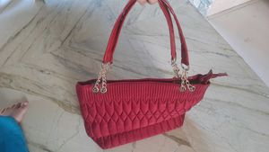 Red Quilted Handbag with Gold Detail