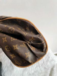 Louis Vuitton Logo Handbag with tassel