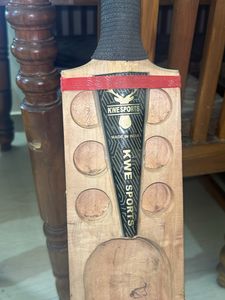 Red Tennis Ball Bat