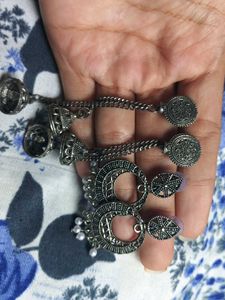 Oxidized Silver Jhumka Earrings And A Necklace