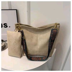 Grey Handbag with Colorful Strap