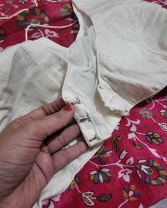 Dola silk saree with white paded blouse