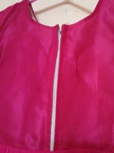 Pink Net Dress With Proper Lining Inside.