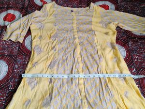 Beautiful Yellow Printed Kurti in Good Condition