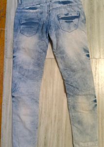 Designer jeans with multiple buttons