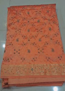 Elegant Peach Saree with stones and breads